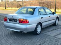 Gebraucht Mitsubishi Carisma 90 PS (66 kW) 1998 Silber Limousine