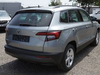 gebraucht Skoda Karoq 1.6 TDI 116 Amb. Nav PDC SHZ Kessy SunSet