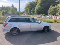 Używany Opel Astra 110 KM (80 kW) 2011 Srebrny Kombi