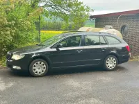 Używany Skoda Superb 125 KM (91 kW) 2013 Czarny Kombi