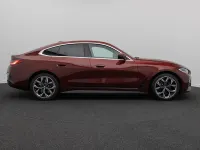Gebraucht BMW i4 M Sport 250 kW (340 PS) 2023 Aventurinrot c57 Limousine