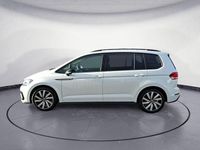 Gebraucht VW Touran Highline 150 PS (110 kW) 2025 Oryxweiß perlmutteffekt Van / Kleinbus
