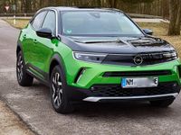 Gebraucht Opel Mokka-e Elegance 100 kW (136 PS) 2023 Grün SUV