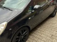 Używany Opel Corsa 80 KM (58 kW) 2010 Czarny Hatchback
