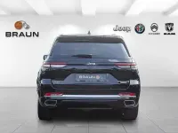Gebraucht Jeep Grand Cherokee Summit 381 PS (280 kW) 2023 Diamond black SUV