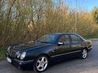 Second-hand Mercedes E250 150 CP (110 kW) 1998 Negru Berlinǎ