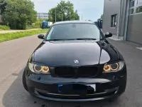 Gebraucht BMW 116 122 PS (89 kW) 2009 Schwarz Kleinwagen