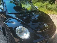 Gebraucht VW New Beetle 102 PS (75 kW) 2010 Schwarz Kleinwagen
