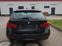 Second-hand BMW 318 143 CP (105 kW) 2014 Negru Break
