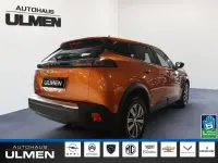 Gebraucht Peugeot 2008 Active 101 PS (74 kW) 2023 Orange SUV