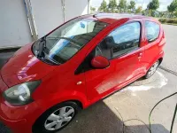 Gebraucht Toyota Aygo 68 PS (50 kW) 2009 Rot Kleinwagen