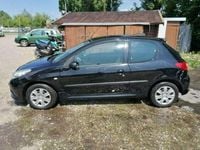 Gebraucht Peugeot 206+ Basis 68 PS (50 kW) 2010 Schwarz Kleinwagen