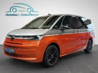 Second-hand VW Multivan Style 150 CP (110 kW) 2024 Portocaliu Monovolum