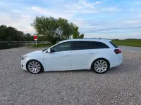 Używany Opel Insignia OPC 194 KM (142 kW) 2014 Biały Kombi