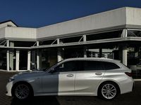 Gebraucht BMW 330 Sport Line 286 PS (210 kW) 2022 Mineralweiß (metallic) Kombi