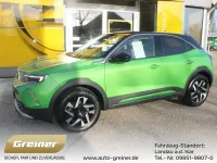 Gebraucht Opel Mokka Elegance 131 PS (96 kW) 2023 Matcha grün (metallic) SUV