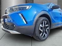 Gebraucht Opel Mokka Elegance 131 PS (96 kW) 2023 Lackierung voltaic blue met/ty SUV