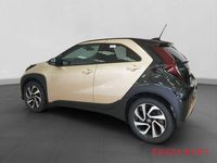 Gebraucht Toyota Aygo X Team 72 PS (52 kW) 2024 Ginger beige / night sky black SUV