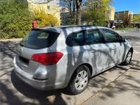 Second-hand Opel Astra 116 CP (85 kW) 2011 Argintiu Break