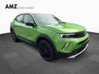 Gebraucht Opel Mokka Elegance 136 PS (100 kW) 2023 Lackierung matcha green/typ au SUV