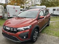 Neu Dacia Jogger Expression 122 PS (89 kW) 2025 Braun Van / Kleinbus
