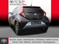 Gebraucht Toyota Aygo X Basis 72 PS (52 kW) 2025 Celestite grey metallic / night sky black SUV