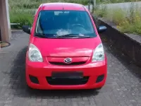 Gebraucht Daihatsu Cuore 69 PS (50 kW) 2007 Rot Kleinwagen