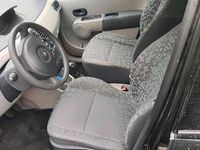 Używany Renault Modus 75 KM (55 kW) 2005 Czarny Minivan