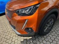Gebraucht Peugeot e-2008 Active 100 kW (136 PS) 2021 Lackierung orange fusion/typ aussenverkl (metallic) SUV