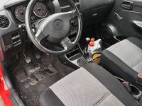 Gebraucht Daihatsu Cuore 50 PS (36 kW) 2005 Rot Kleinwagen