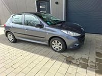 Gebraucht Peugeot 206+ 73 PS (53 kW) 2011 Grau Kleinwagen