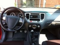 Gebraucht Kia Rio EX 132 PS (97 kW) 2006 Rot metallic Kleinwagen