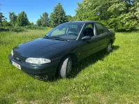 Używany Ford Mondeo 111 KM (81 kW) 1996 Czarny Sedan/Limuzyna