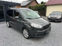 Gebraucht Ford Tourneo Courier Titanium 101 PS (74 kW) 2015 Magneticgrau (metallic) Van / Kleinbus