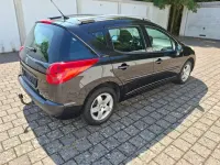 Gebraucht Peugeot 207 Premium 95 PS (69 kW) 2010 Schwarz Kombi
