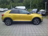 Gebraucht VW T-Roc IQ Drive 116 PS (85 kW) 2019 Kurkumagelb metallic/schwarz SUV