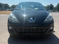 Gebraucht Peugeot 207 73 PS (53 kW) 2011 Schwarz Kleinwagen