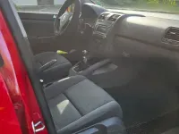 Second-hand VW Golf IV 75 CP (55 kW) 2006 Roșu Berlinǎ