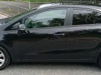 Gebraucht Kia Rio 109 PS (80 kW) 2016 Schwarz Kleinwagen