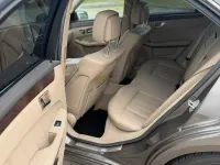 Używany Mercedes E500 408 KM (300 kW) 2011 Brązowy Sedan/Limuzyna