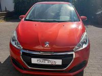 Gebraucht Peugeot 208 82 PS (60 kW) 2015 Orange Kleinwagen