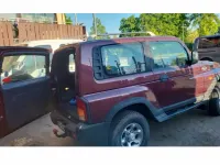 Gebraucht SsangYong Korando 150 PS (110 kW) 1997 Rot