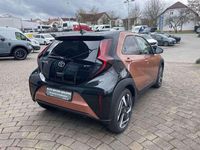 Gebraucht Toyota Aygo X 116 PS (85 kW) 2026 Cinnamon bronze metallic / bla SUV