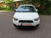 Gebraucht Mitsubishi Colt Motion 75 PS (55 kW) 2012 Porcelain white Kleinwagen
