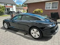 Second-hand Porsche Taycan 300 kW (408 CP) 2024 Negru Berlinǎ