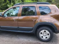 Używany Dacia Duster 105 KM (77 kW) 2010 Brązowy SUV