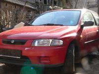 Gebraucht Mazda 323 73 PS (53 kW) 1997 Rot Kleinwagen