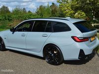 Gebraucht BMW 320e Performance 204 PS (150 kW) 2023 Grau Kombi