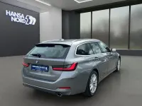 Gebraucht BMW 330 Comfort Edition 286 PS (210 kW) 2023 Grau / skyscraper grau (metallic) Kombi