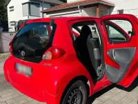 Gebraucht Toyota Aygo 68 PS (50 kW) 2007 Rot Kleinwagen